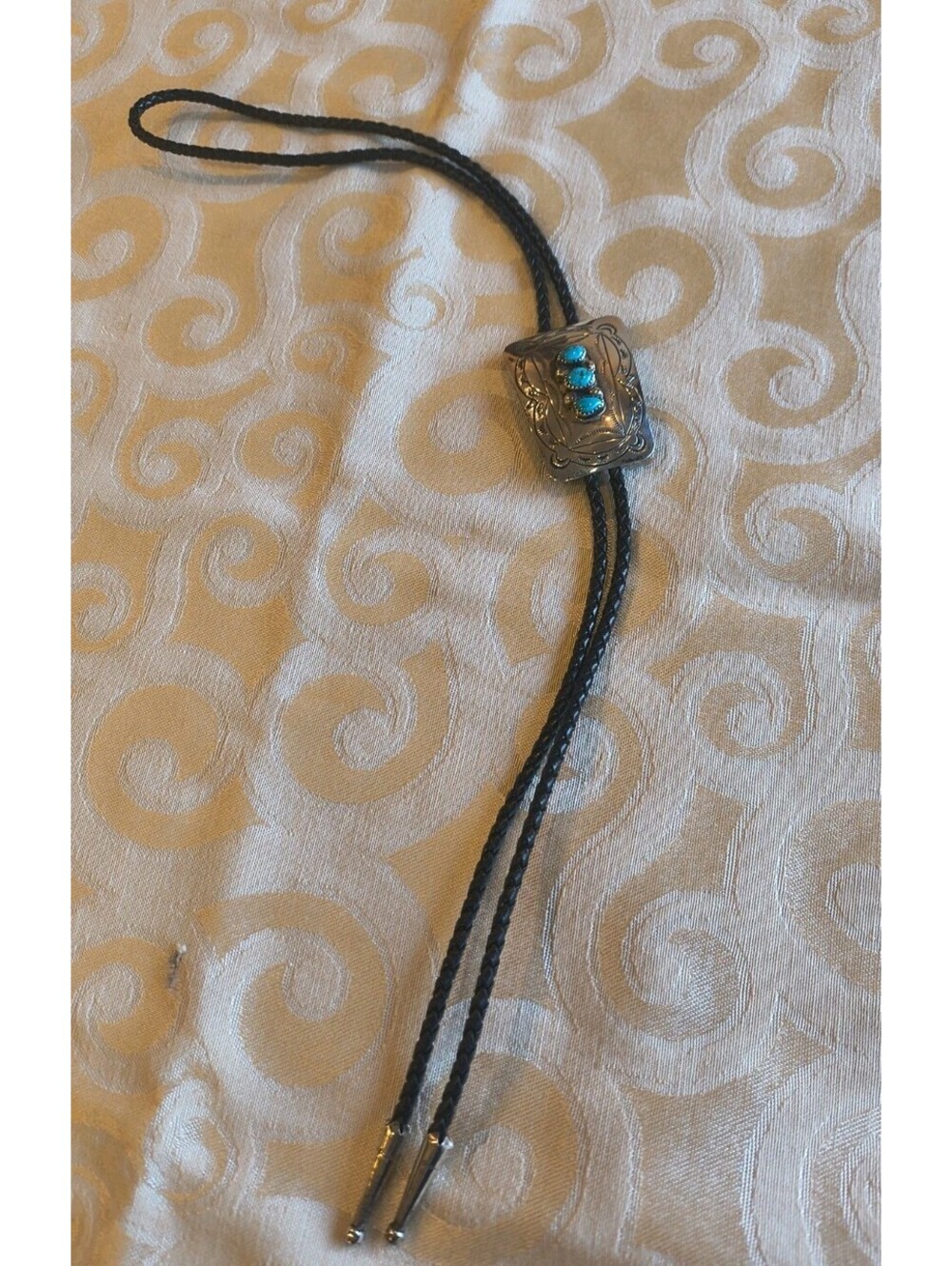 Native American Artist Turquoise Cabachon Sterling Silver Bolo Stamped Leather